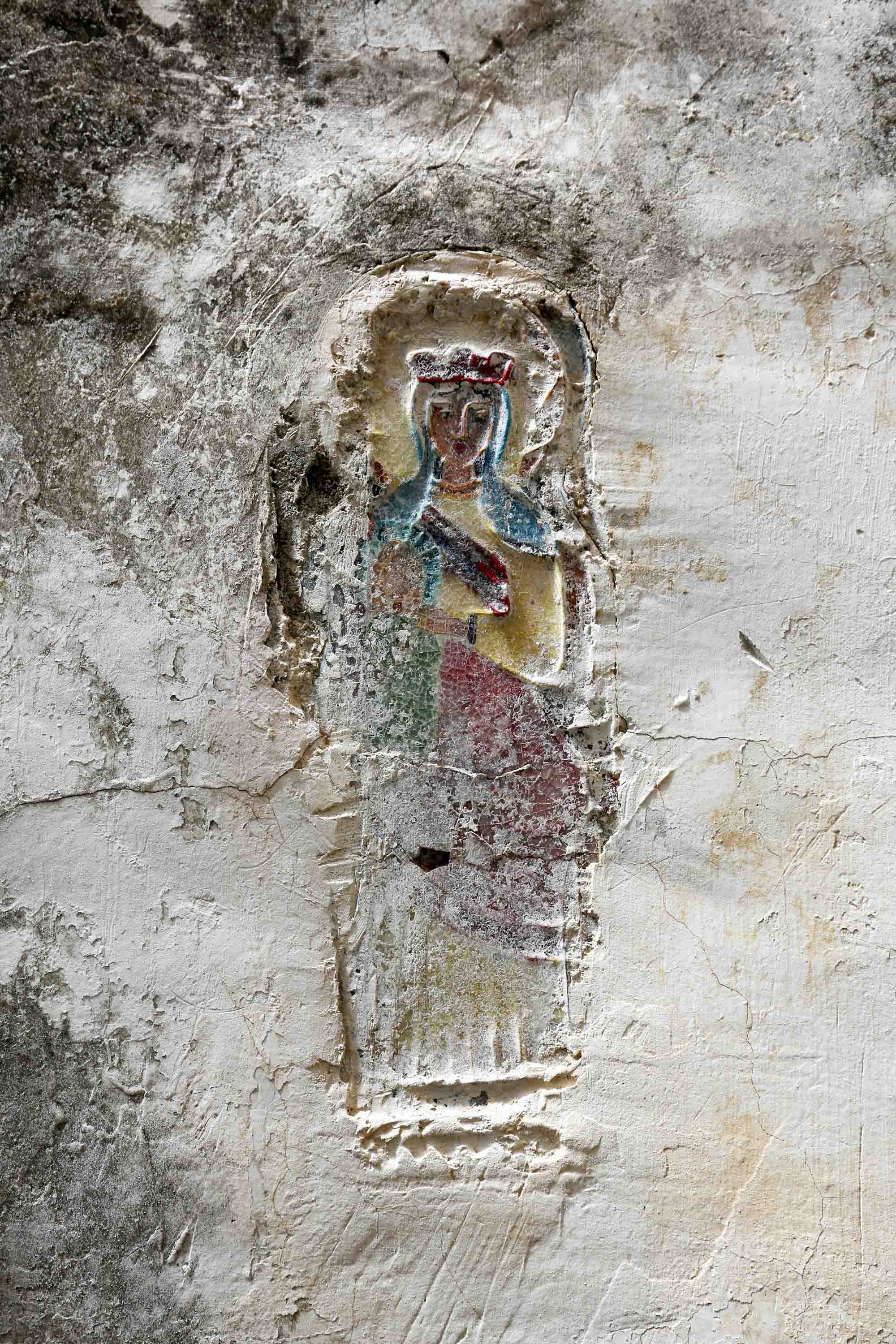 Kleinod an einer Mauer